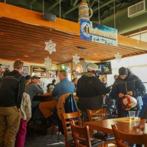 Discover The Den at Bear Peak —a cozy spot for après-ski with family and friends. Enjoy tasty dishes, local brews, live music every Saturday, and stunning mountain views. You can even take your beverage and food on the patio or by the firepit to enjoy the mountain views.🐻 

📖 Learn more by visiting the link in our bio.